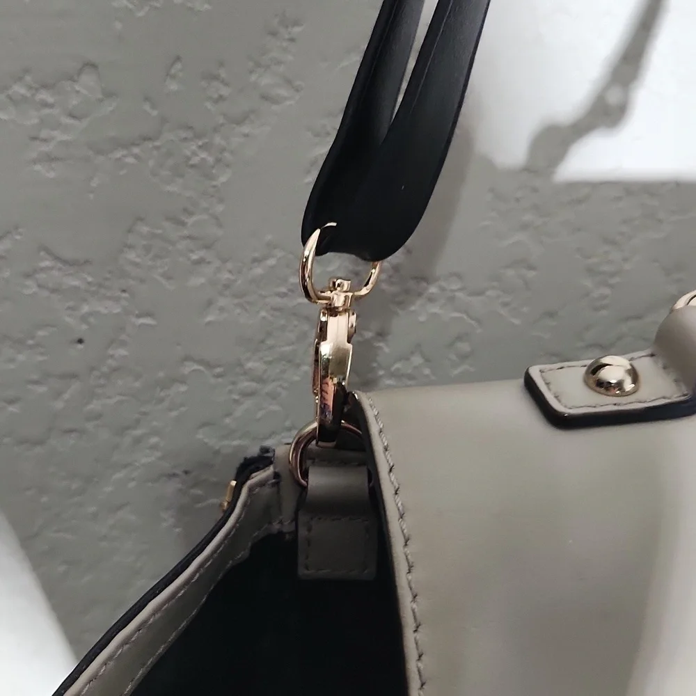 Kate Spade Purse good condion has some scuffs -latch and indent strap non ks